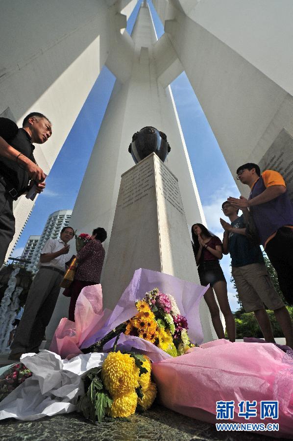 （国际）（2）新加坡举行祭礼缅怀日占时期死难人民 