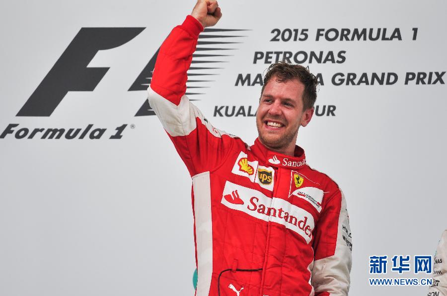 （体育）（1）赛车&mdash;&mdash;F1大奖赛马来西亚站维泰尔夺冠