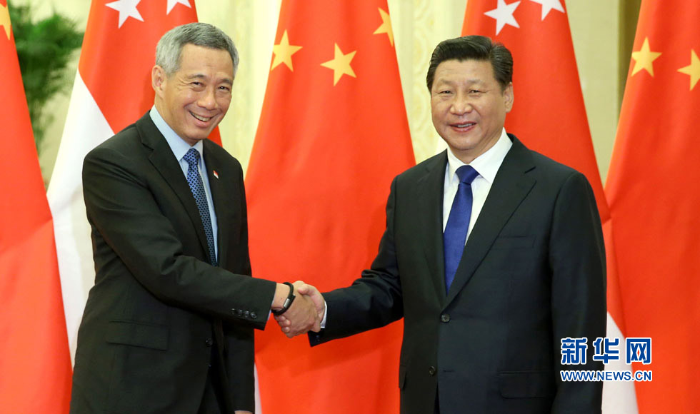 2014年11月9日，国家主席习近平在北京人民大会堂会见新加坡总理李显龙。
新华社记者庞兴雷摄